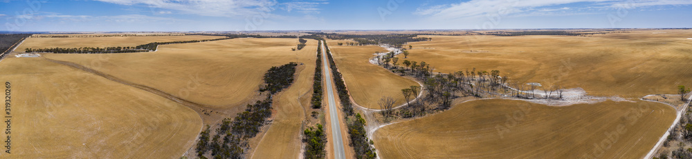 Aerial panoramic image of the South Coast Highway cutting through the drought afflicted wheat belt in Western Australia