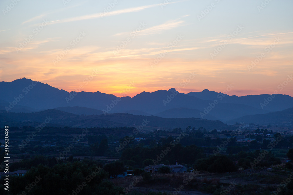 Fototapeta premium beautiful sunset sky over mountains on Sardinia