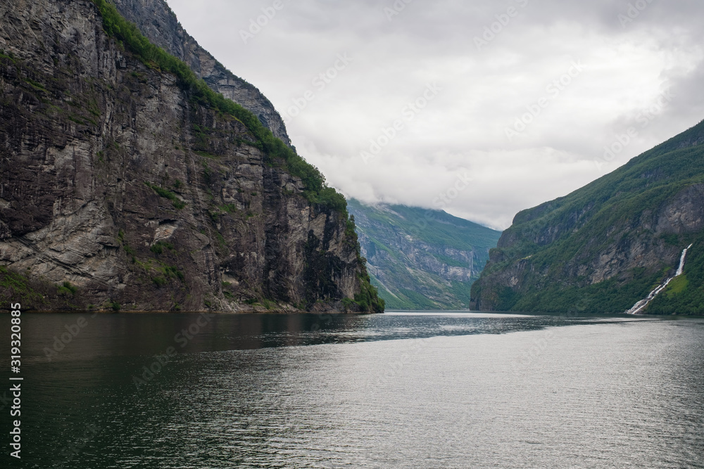 natural landscape at geirangerfjord in norway in summer cloudt day. July 2019