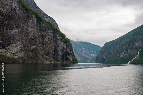 natural landscape at geirangerfjord in norway in summer cloudt day. July 2019