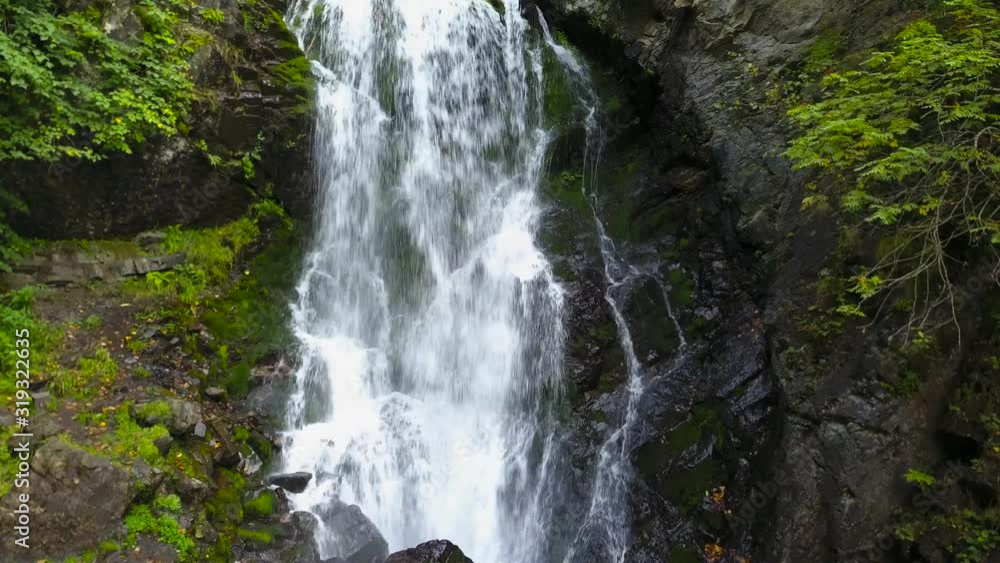 Large waterfall in the mountains in spring in the green 4k Large waterfall in the mountains in spring in the green 4k
