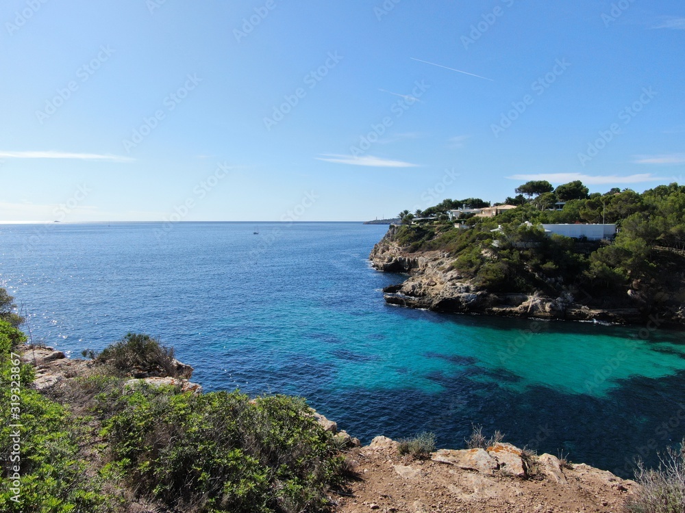  View of the a beach of mallorca with sea colour turquoise and blue sky concept of holiday and summer