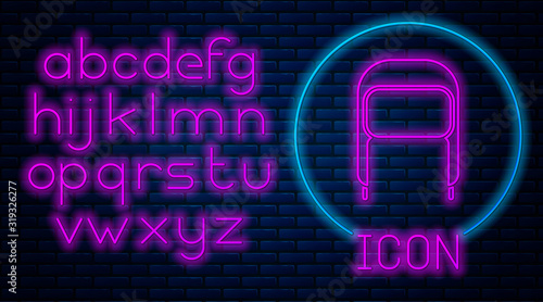 Glowing neon Winter hat with ear flaps icon isolated on brick wall background. Neon light alphabet. Vector Illustration