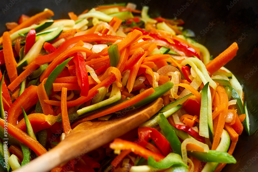 Wok of colorful and varied vegetables Wok of colorful and varied vegetables