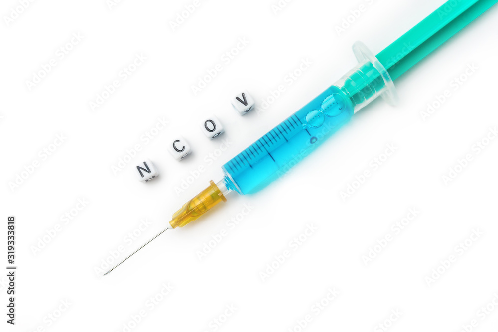 Novel coronavirus - 2019-nCoV concept, syringe isolated on white Novel coronavirus - 2019-nCoV concept, syringe isolated on white