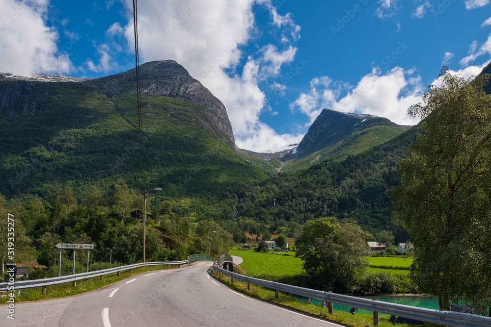Mountains over the beautiful lake Oldevatnent in Stryn, Norway. July 2019