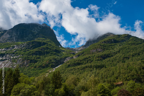 Mountains over the beautiful lake Oldevatnent in Stryn, Norway. July 2019