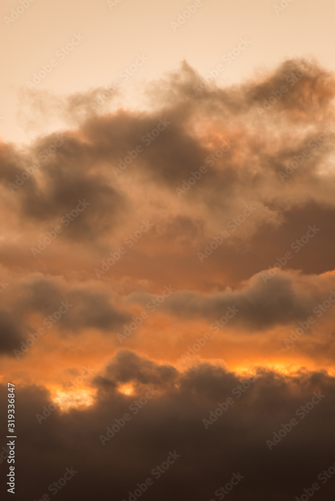 Clouseup of cloudy sky after the rain by sunset