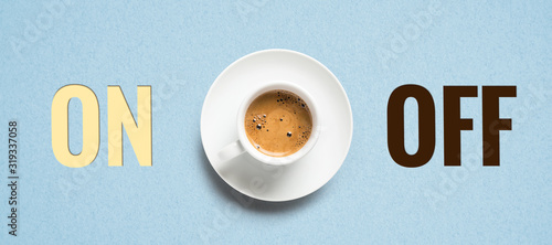 Tablou pe pânză cup of coffee and cubes with text ON and OFF on paper background