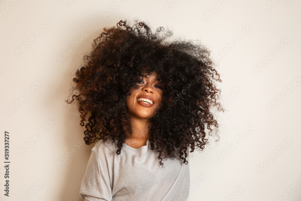 Beauty portrait of african american woman with afro hairstyle and glamour  makeup. Brazilian woman. Mixed race. Curly hair. Hair style. White  background. Stock Photo | Adobe Stock