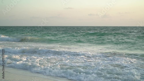 Waves sliding up on a beach, Sand beach beautiful turquoise sea photo
