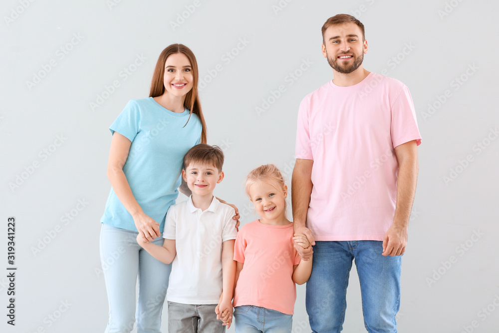 Portrait of happy family on light background Portrait of happy family on light background