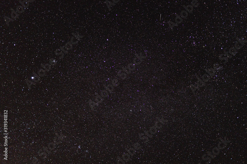 starry night sky with extremely clear conditions making a lot of constellations visible as well as some meteors or satellite trails shot from Tasmania