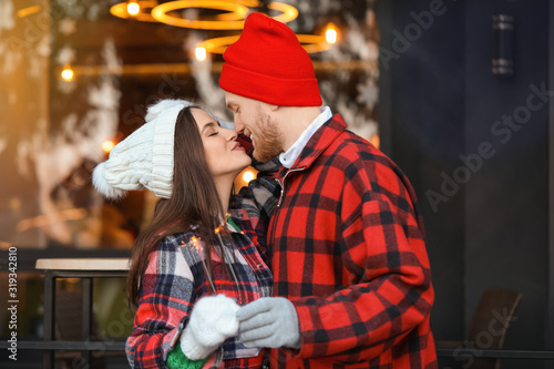 Happy young couple with Chr...