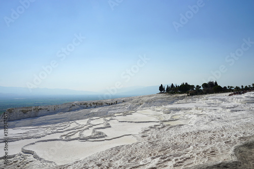 Panoramic view of the beautiful white Travertines terrace of Pamukkale landscape