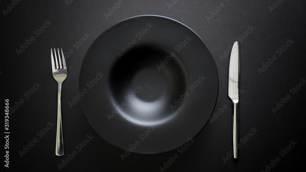 Top view of cutlery and empty plate Top view of cutlery and empty plate