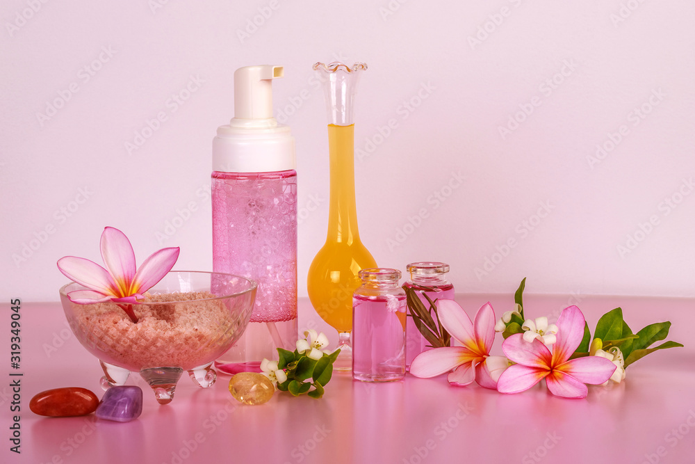 Spa composition with bows with salt, flowers, towel, crystals, soap, oil and lotions. Spa composition with bows with salt, flowers, towel, crystals, soap, oil and lotions.