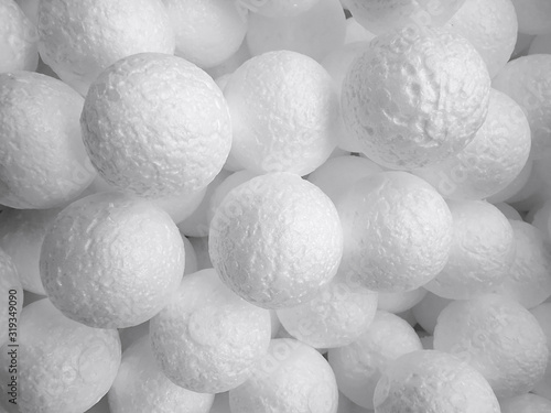 Background of white circle styrofoam ball pattern texture foam surface abstract background photo