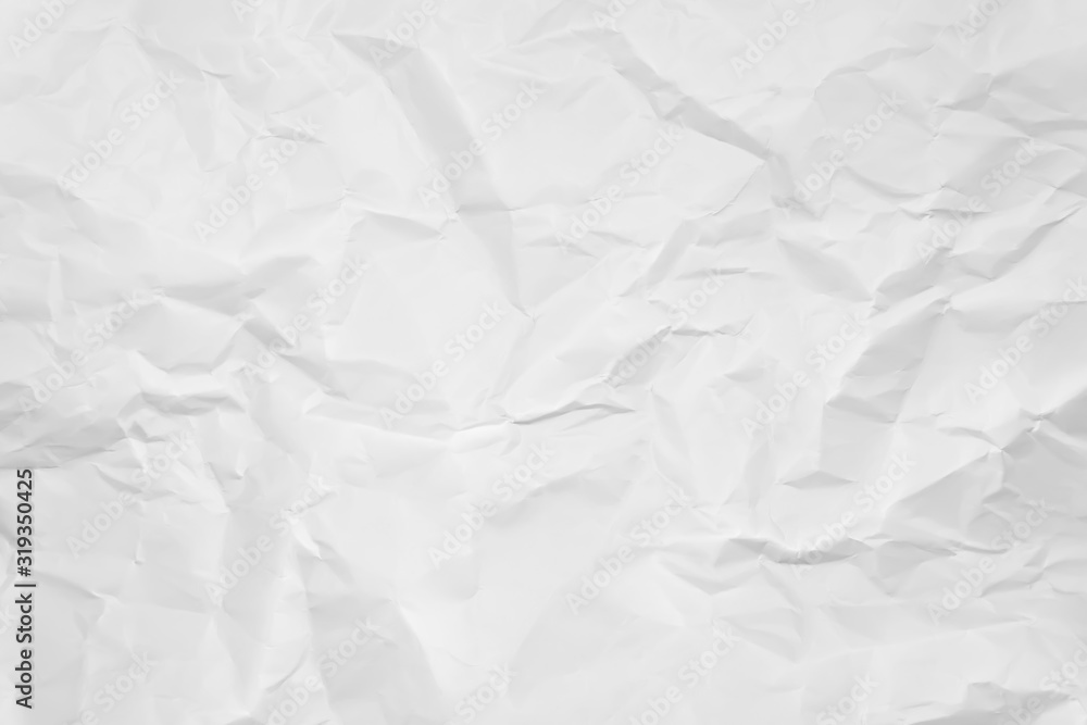 Fototapeta premium White crumpled paper texture background. Clean white paper. Top view.