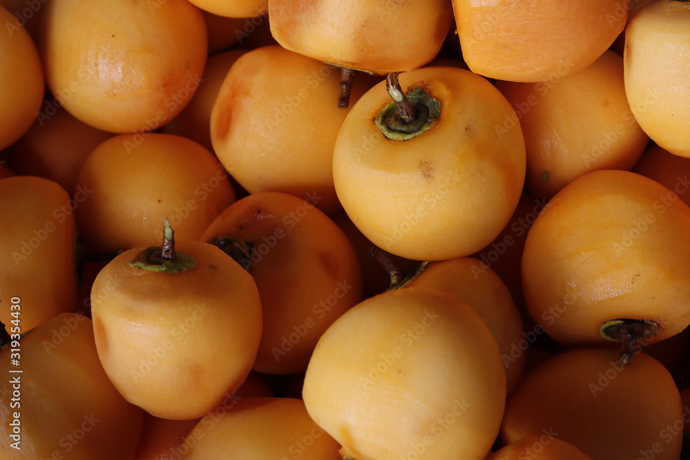 Raw persimmon preparing to hanging to make dry japanese persimmon (hoshigaki)