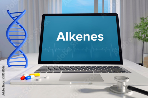 Alkenes – Medicine/health. Computer in the office with term on the screen. Science/healthcare
