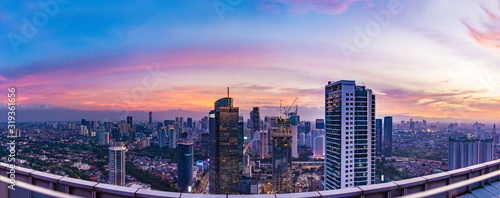 Jakarta, Indonesia - 20 Dec 2018: Aerial view of Jakarta's Central Business District (Sudirman and Kuningan) at sunset. Central Jakarta cityscape (Menteng Subdistrict). photo