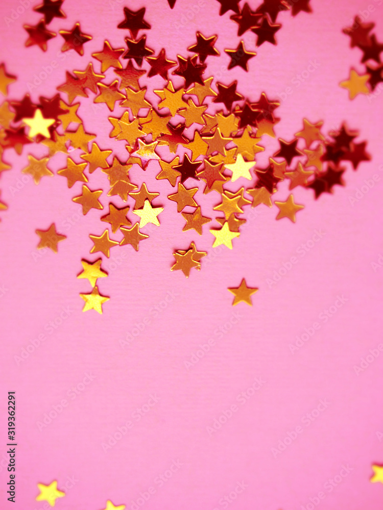 Golden stars glitter on pink background Golden stars glitter on pink background