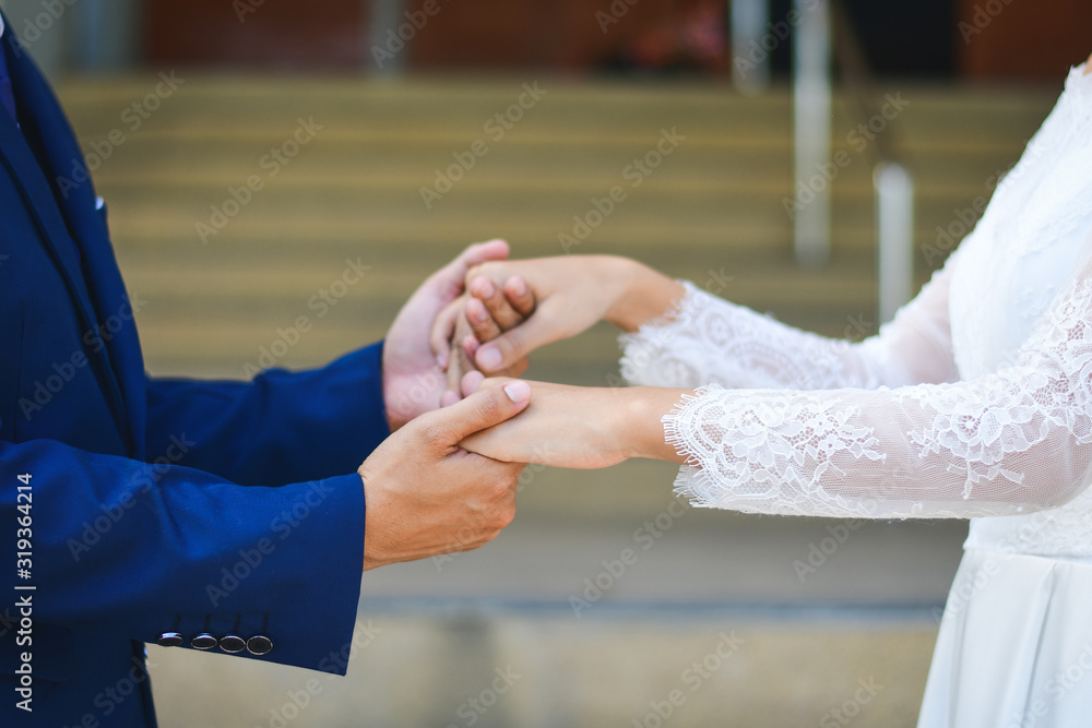 Happy traveler couple. Loving couple holding hands close-up. Happy traveler couple. Loving couple holding hands close-up.