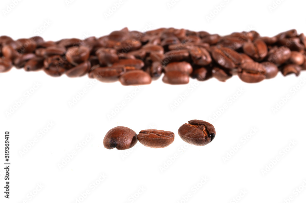Obraz premium coffee grains isolated on white background