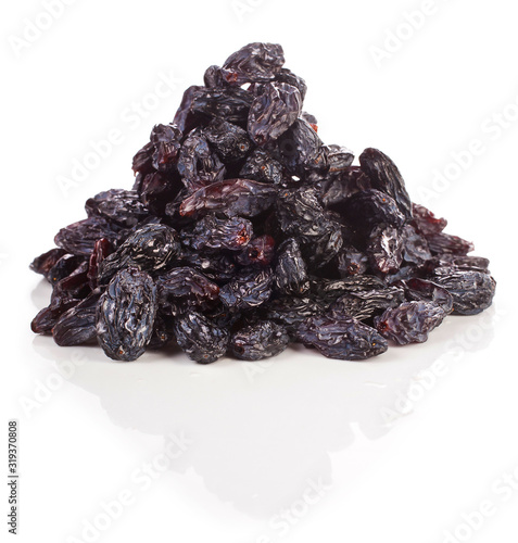 Heap of raisins isolated on a white background.