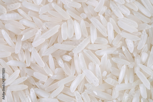 Close-up of white rice seed texture background. Organic, natural long rice grain, food for healthy. Agriculture of culture asian. Top view
