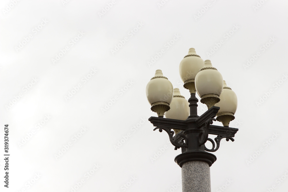 retro classicism modern street lamp on white background. round shades, four bulbs retro classicism modern street lamp on white background. round shades, four bulbs