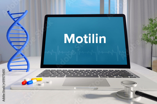 Motilin– Medicine/health. Computer in the office with term on the screen. Science/healthcare photo