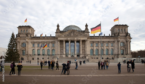 Berlin, Germany - December 30, 2019: People The Reichstag, German Parliament, on a cold day in december 30, 2019.