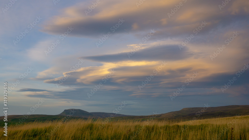 Cloud formations above the fell of Ingleborough in the Yorkshire Dales