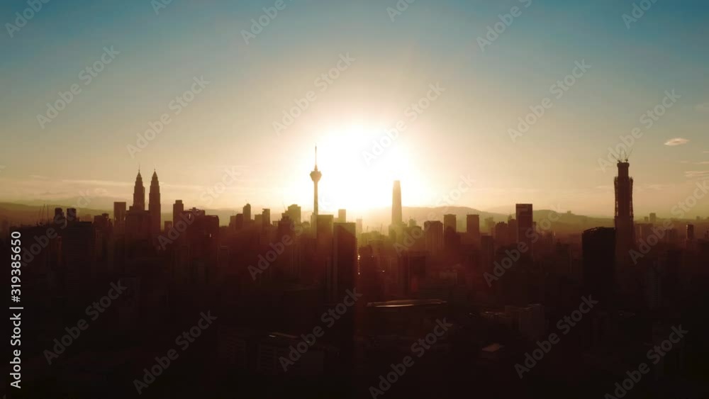 Aerial view of sunset in Kuala Lumpur, Malaysia. Great sunset scene. Photo with noise from action camera Aerial view of sunset in Kuala Lumpur, Malaysia. Great sunset scene. Photo with noise from action camera
