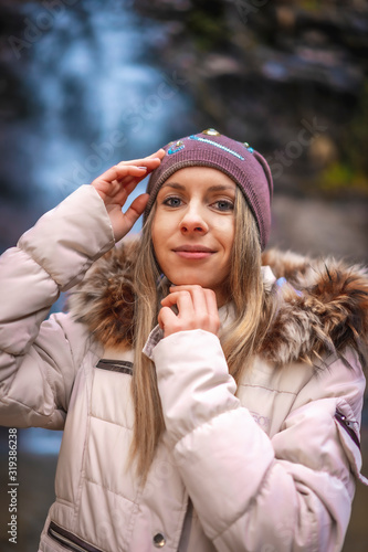 Cascada Uguna, Bizkaia / Spain »; A young blonde inside the waterfall of Uguna photo