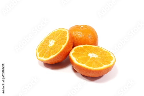 slice orange with leaf on white background 