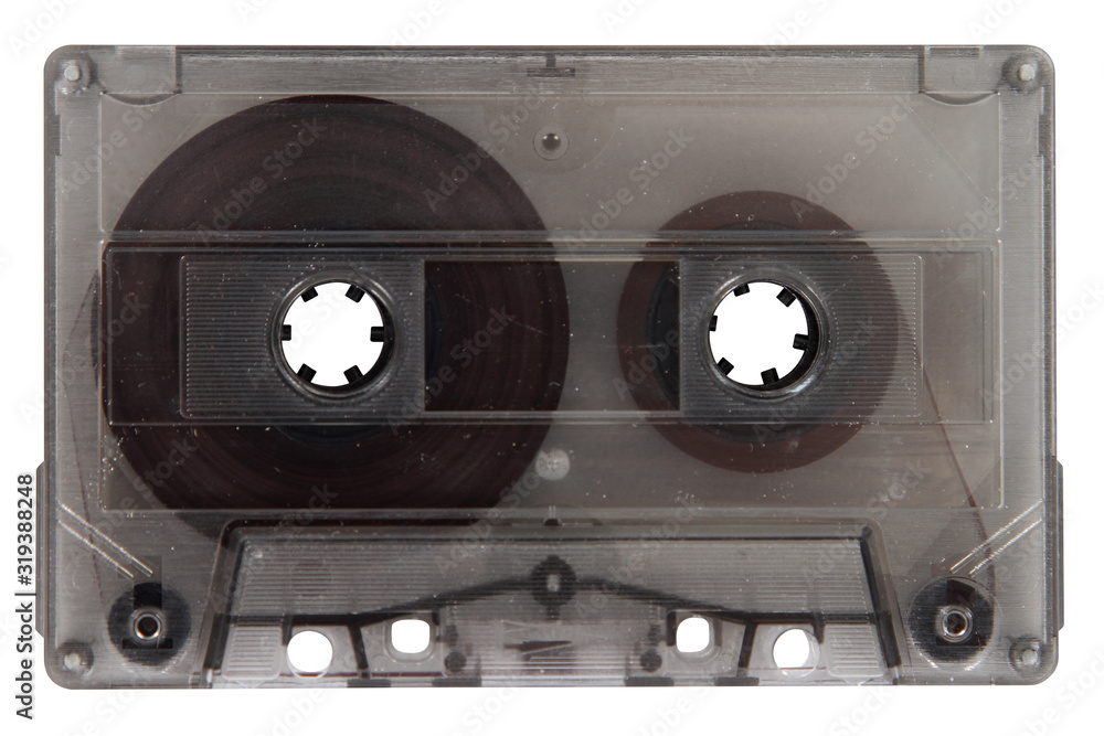 Fototapeta premium A compact audio cassette in a transparent enclosure is insulated against.