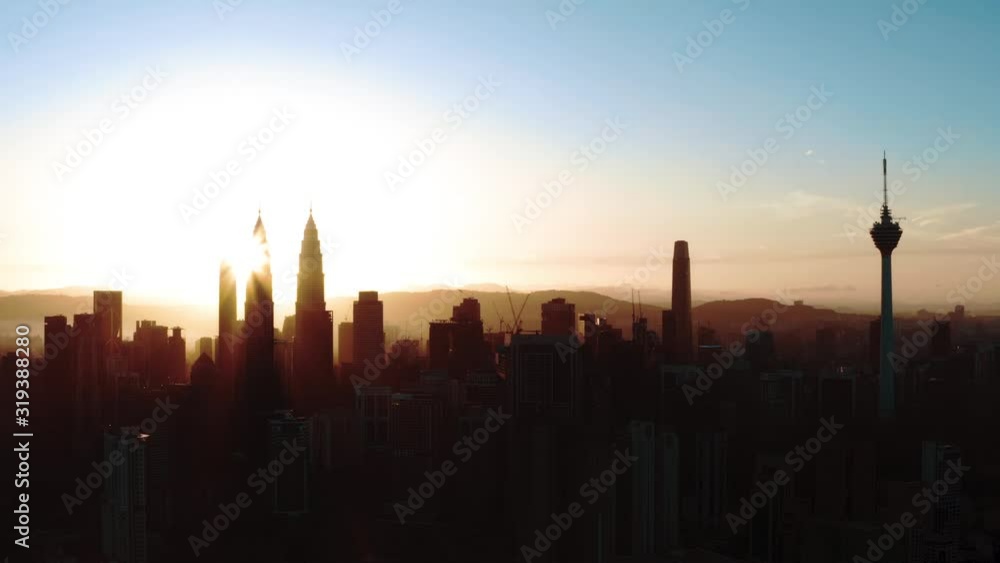 Aerial view of sunset in Kuala Lumpur, Malaysia. Great sunset scene. Photo with noise from action camera Aerial view of sunset in Kuala Lumpur, Malaysia. Great sunset scene. Photo with noise from action camera