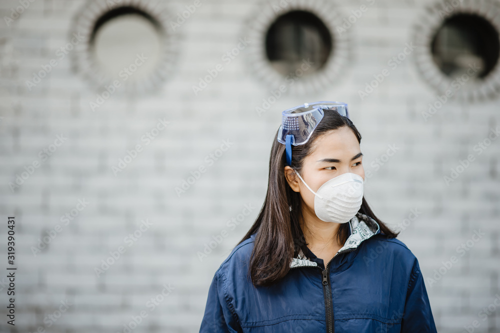 Asian women wear masks to protect against dust and germs.