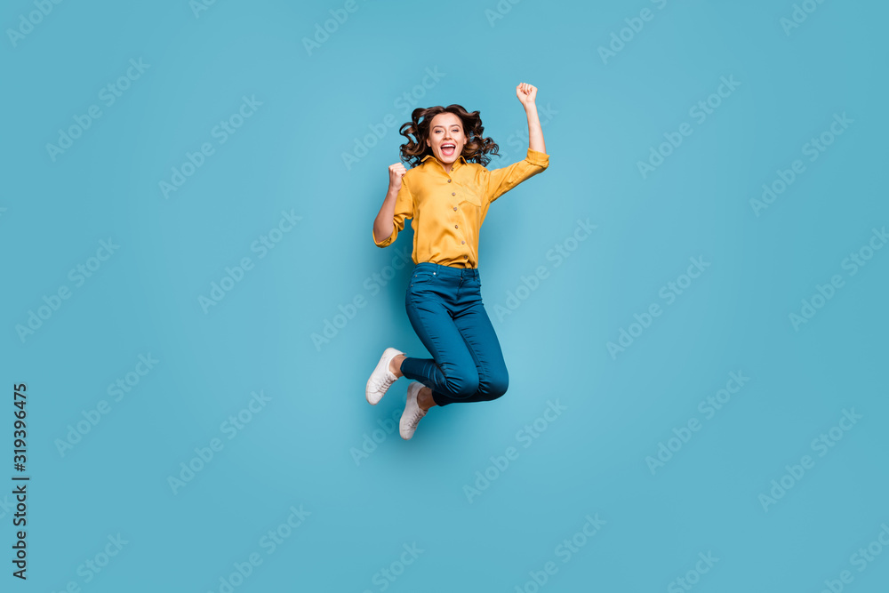 Full length body size view of nice attractive crazy overjoyed cheerful cheery wavy-haired girl jumping having fun rejoicing isolated on bright vivid shine vibrant green blue turquoise color background Full length body size view of nice attractive crazy overjoyed cheerful cheery wavy-haired girl jumping having fun rejoicing isolated on bright vivid shine vibrant green blue turquoise color background