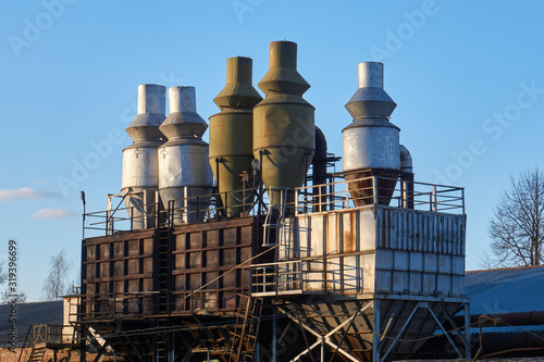 Foto Woodworking industry, rusty used multi cyclone dust collectors