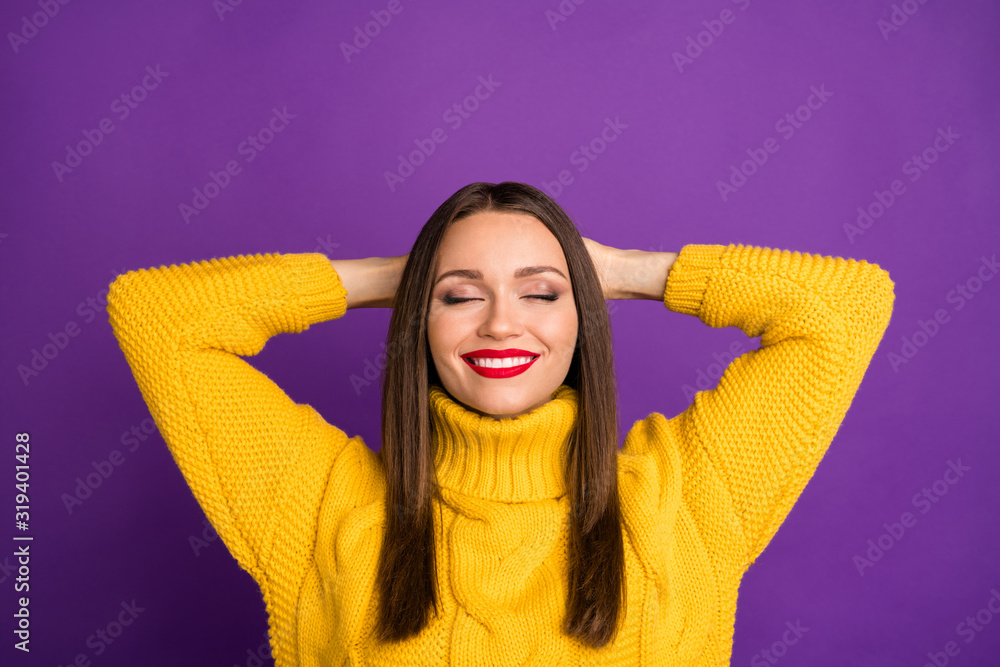 Close up photo of cheerful confident nice pretty sweet woman lying with hands behind head isolated vivid purple color background Close up photo of cheerful confident nice pretty sweet woman lying with hands behind head isolated vivid purple color background
