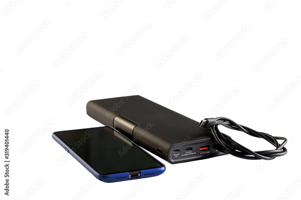 Black power bank with USB cable for smartphone on white background Black power bank with USB cable for smartphone on white background