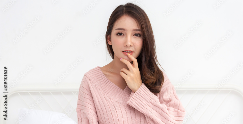 Portrait of smilling happy beautiful asia woman enjoy and relax posing in the room at home.asian beauty Portrait of smilling happy beautiful asia woman enjoy and relax posing in the room at home.asian beauty