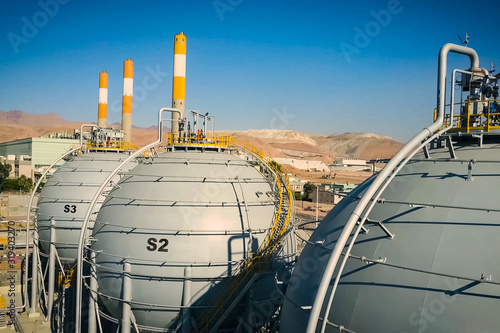 Refinery and storage facilities of oil and petroleum products. O