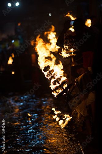 Oct 2018, Rishikesh, Utharkhand, India: Priests performing sacred ganga aarthi at the river ganga Aarti