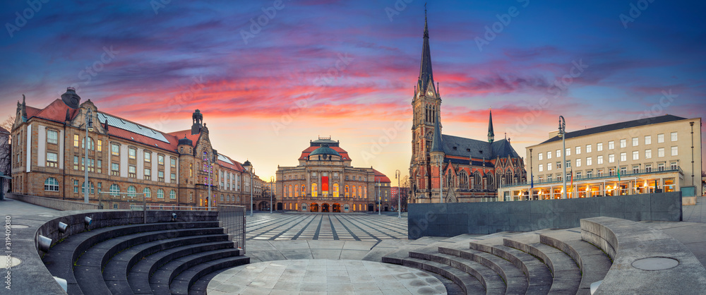 Chemnitz Germany. Panoramic cityscape image of Chemnitz, Germany with Chemnitz Opera and St. Petri Church during beautiful sunset.