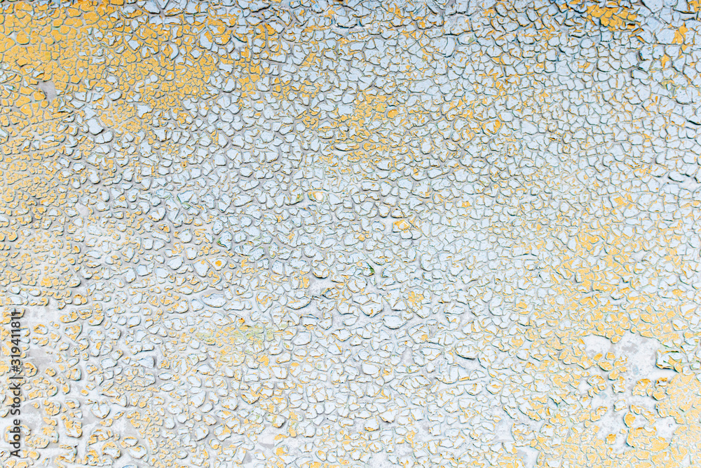 Cracked paint on an old metal surface Cracked paint on an old metal surface